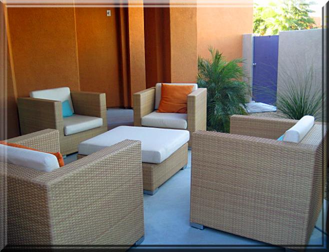 Desert landscped patio as you enter. Comfortable furniture. Gorgeous Palm Springs Vaction Rental