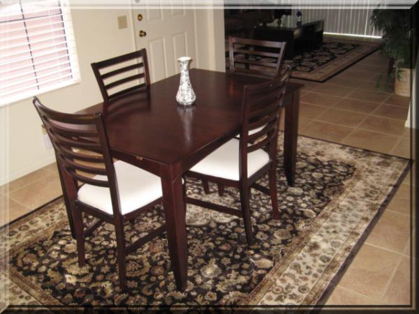 Dining Table with comfortable cushioned chairs