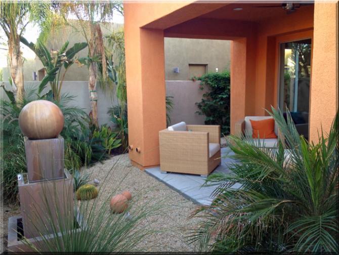 Desert landscped patio as you enter. Comfortable furniture. Gorgeous fountain in this Palm SPrings Vaction Rental